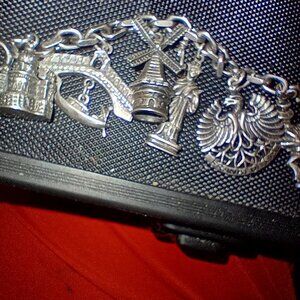 Fine silver charm bracelet
